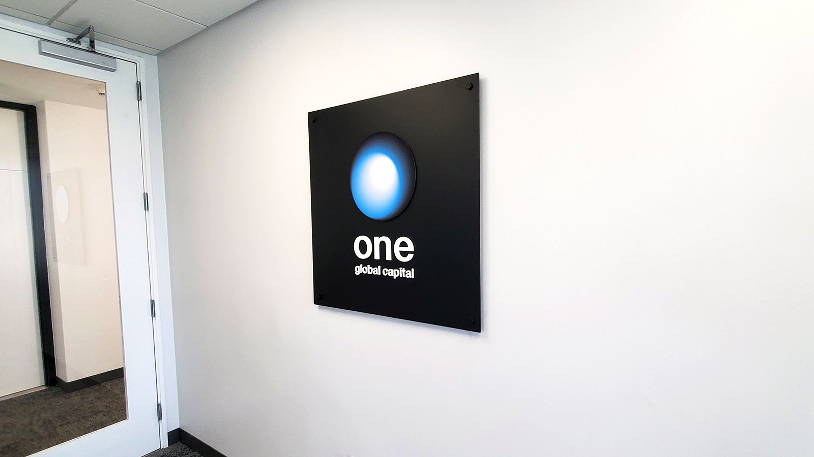 One global capital interior sign