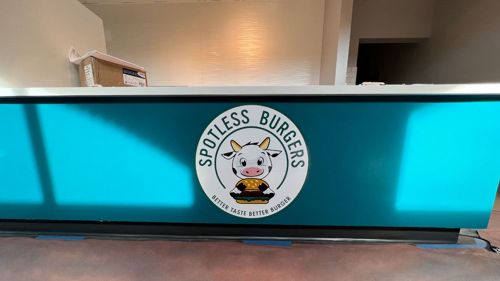 Spotless Burgers interior sign