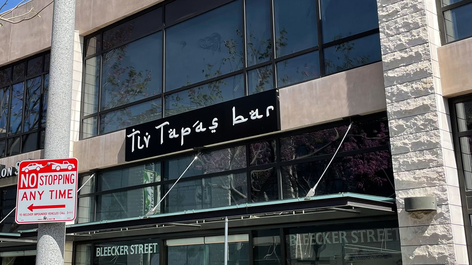Tly tapas bar building signs