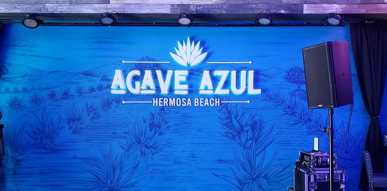 Agave Azul restaurant branding with illuminated design elements