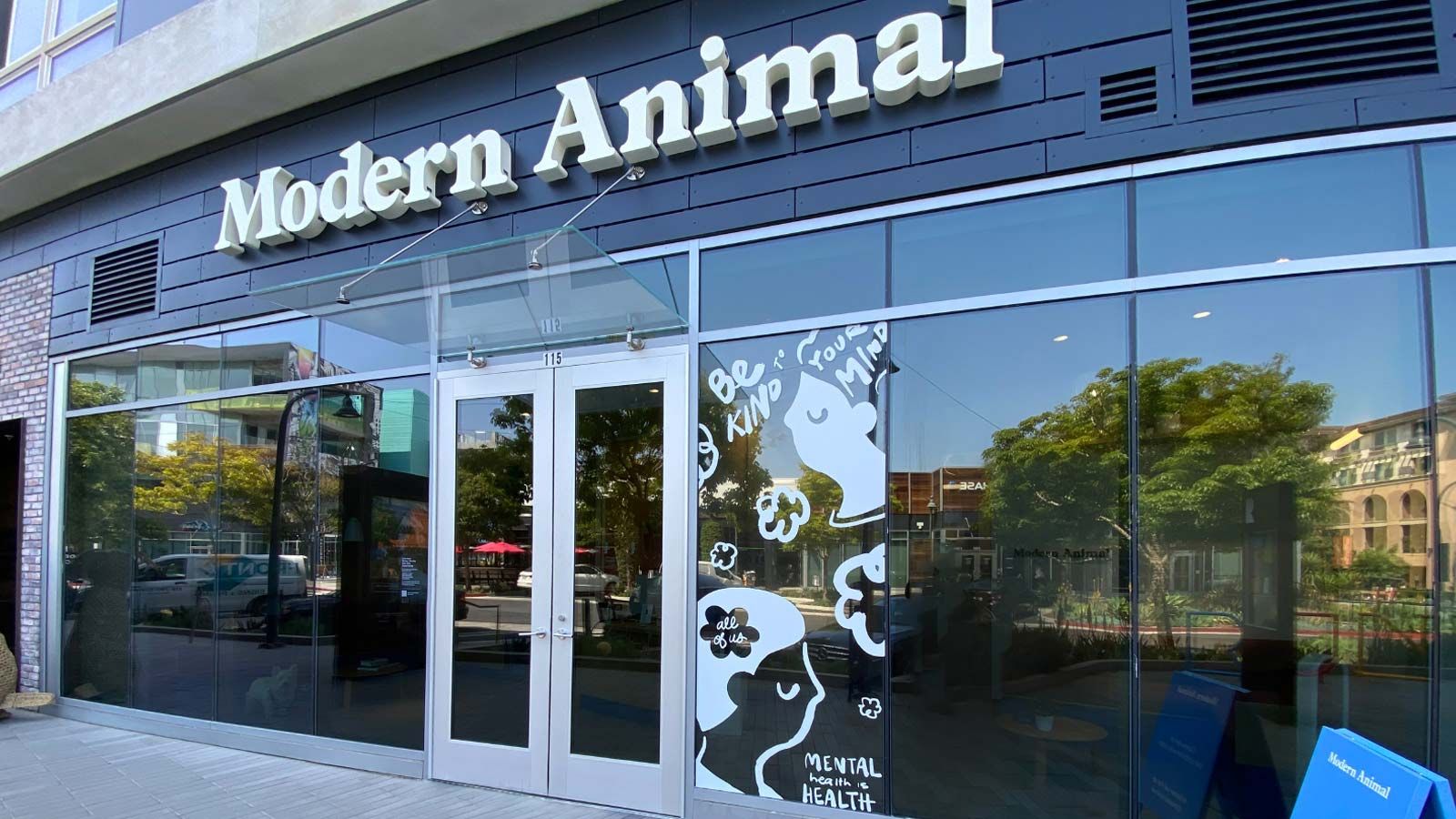 Modern Animal storefront decals