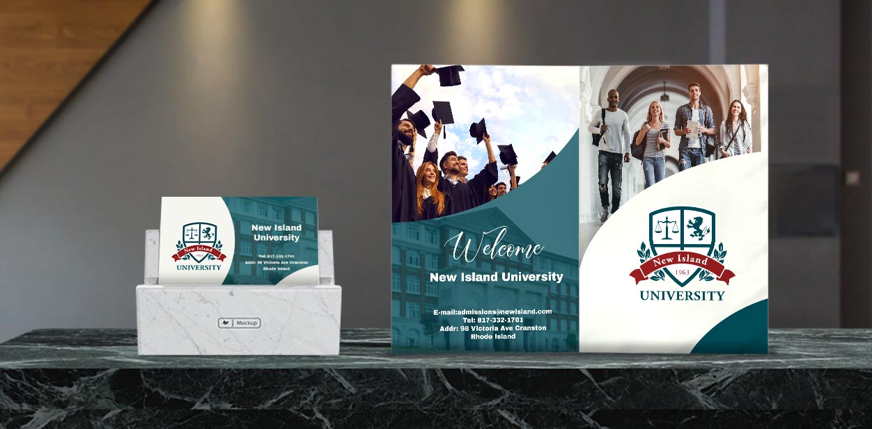 A university branding brochure and business cards on the tabletop
