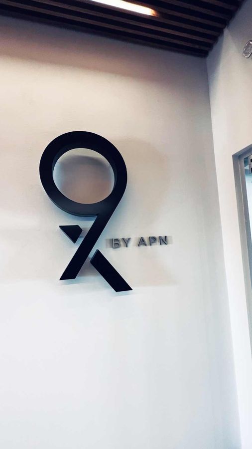 APN Capital backlit interior sign