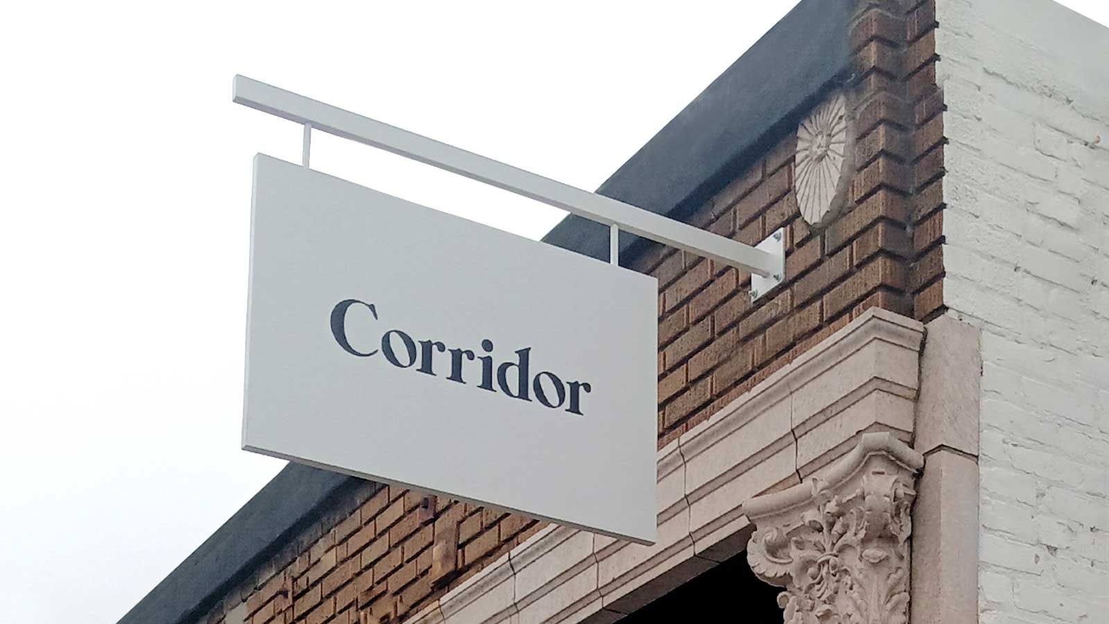 Corridor outdoor wall blade sign