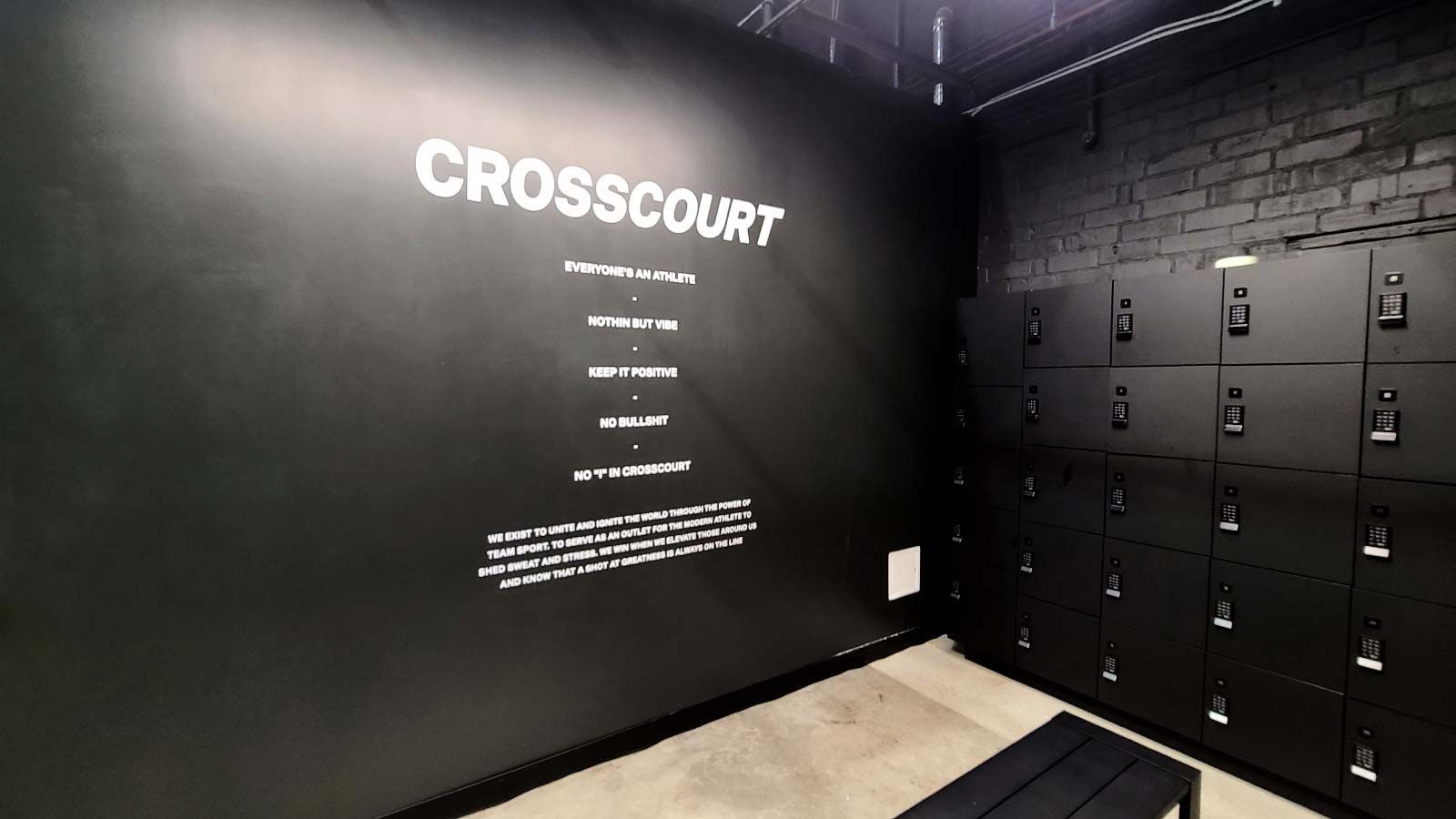 Crosscourt gym sign attached to the wall