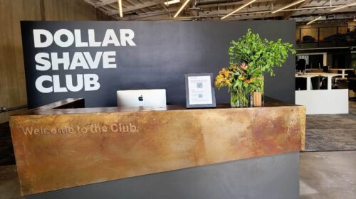Dollar Shave Club vinyl letters adhered to the wall