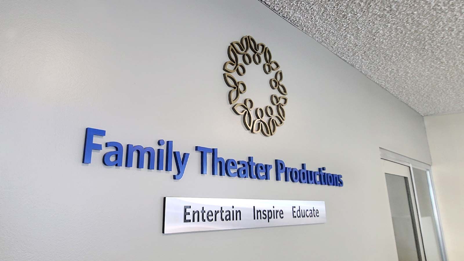 Family Theater Productions wall-mounted aluminum sign