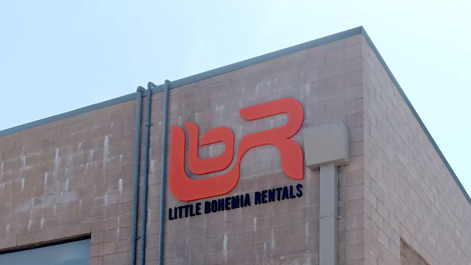 Little Bohemia Rentals building top sign