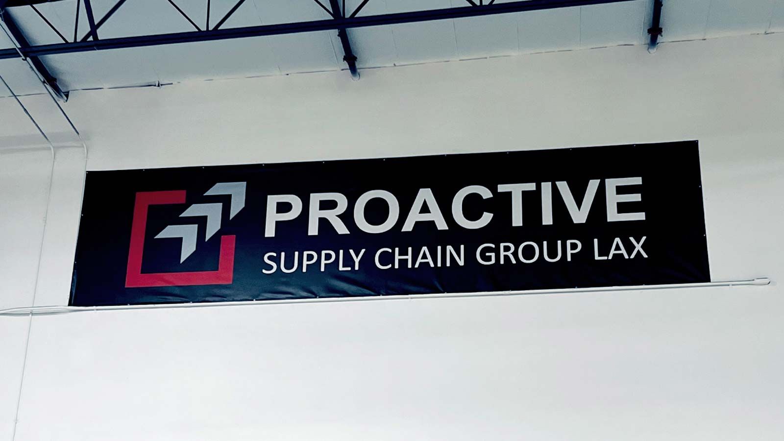 Proactive Supply Chain banner attached to the wall