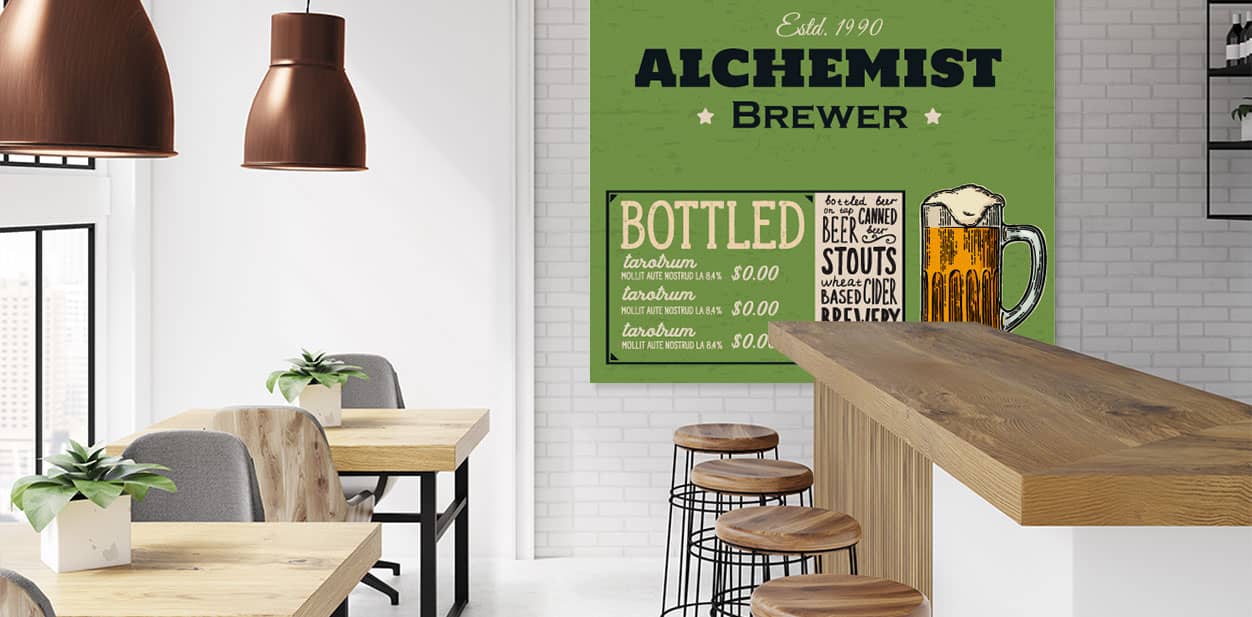 Green brewery branding display in a boho style