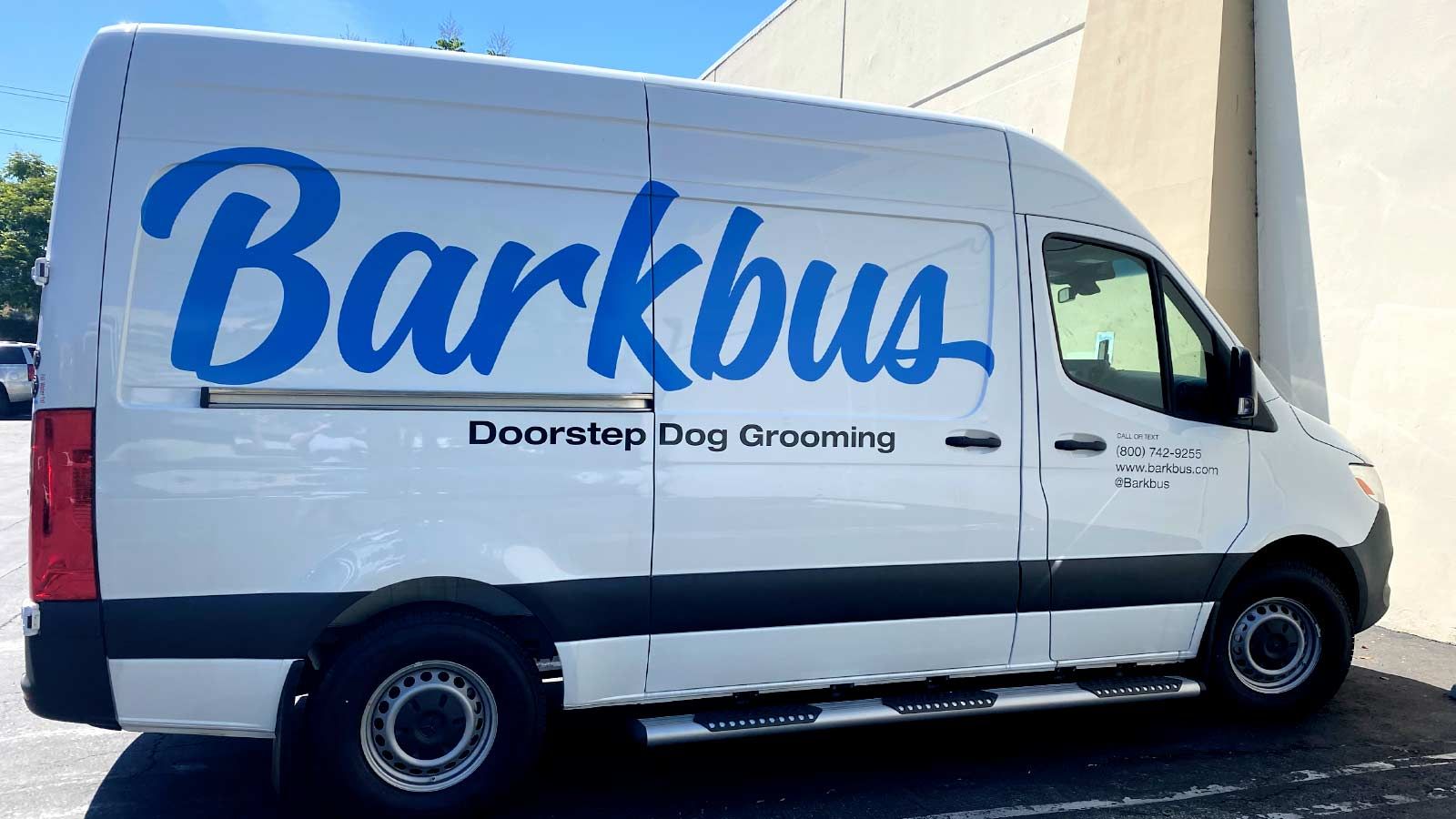 Barkbus car graphics attached to the side of the vehicle