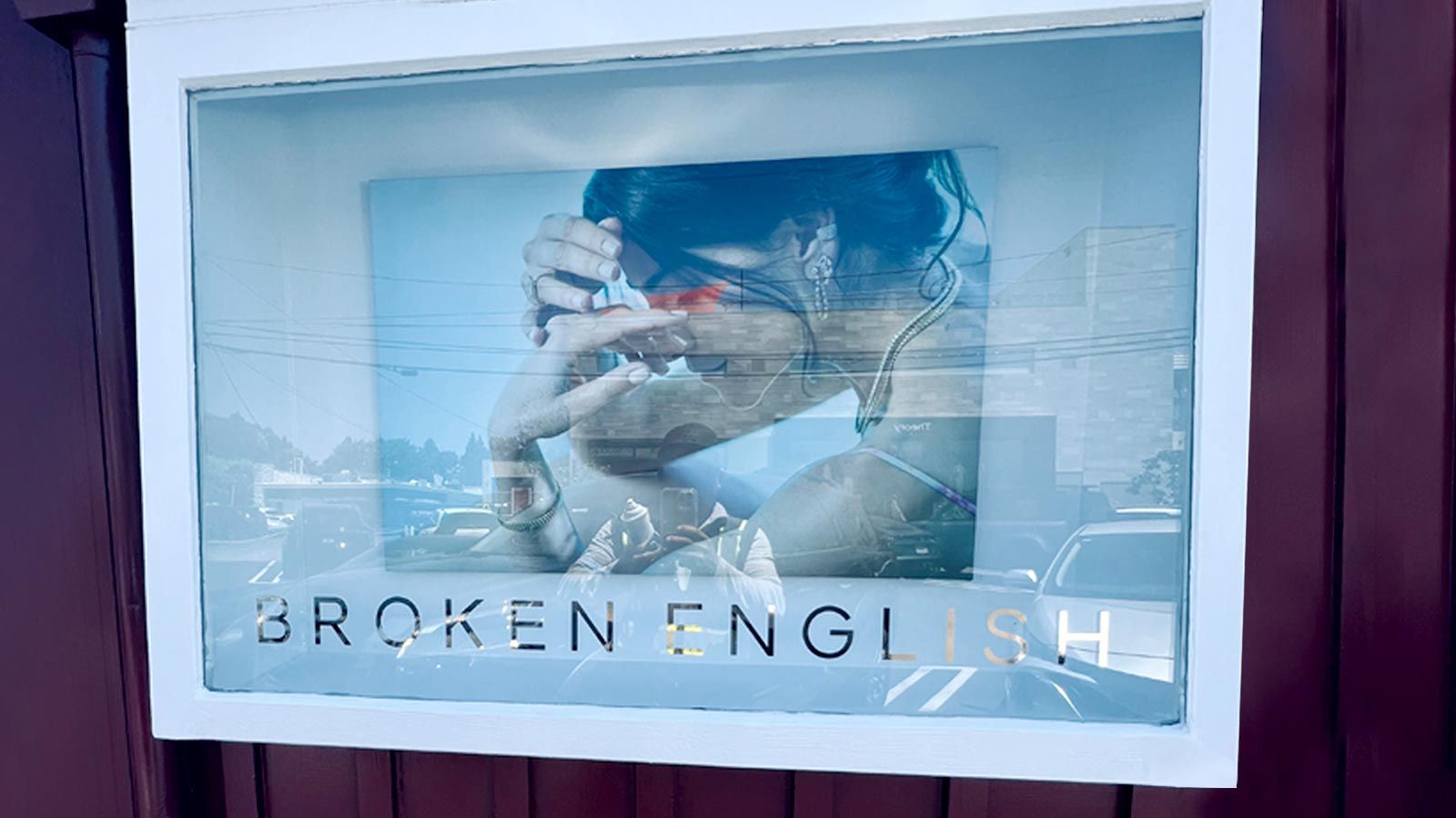Broken English window vinyl lettering