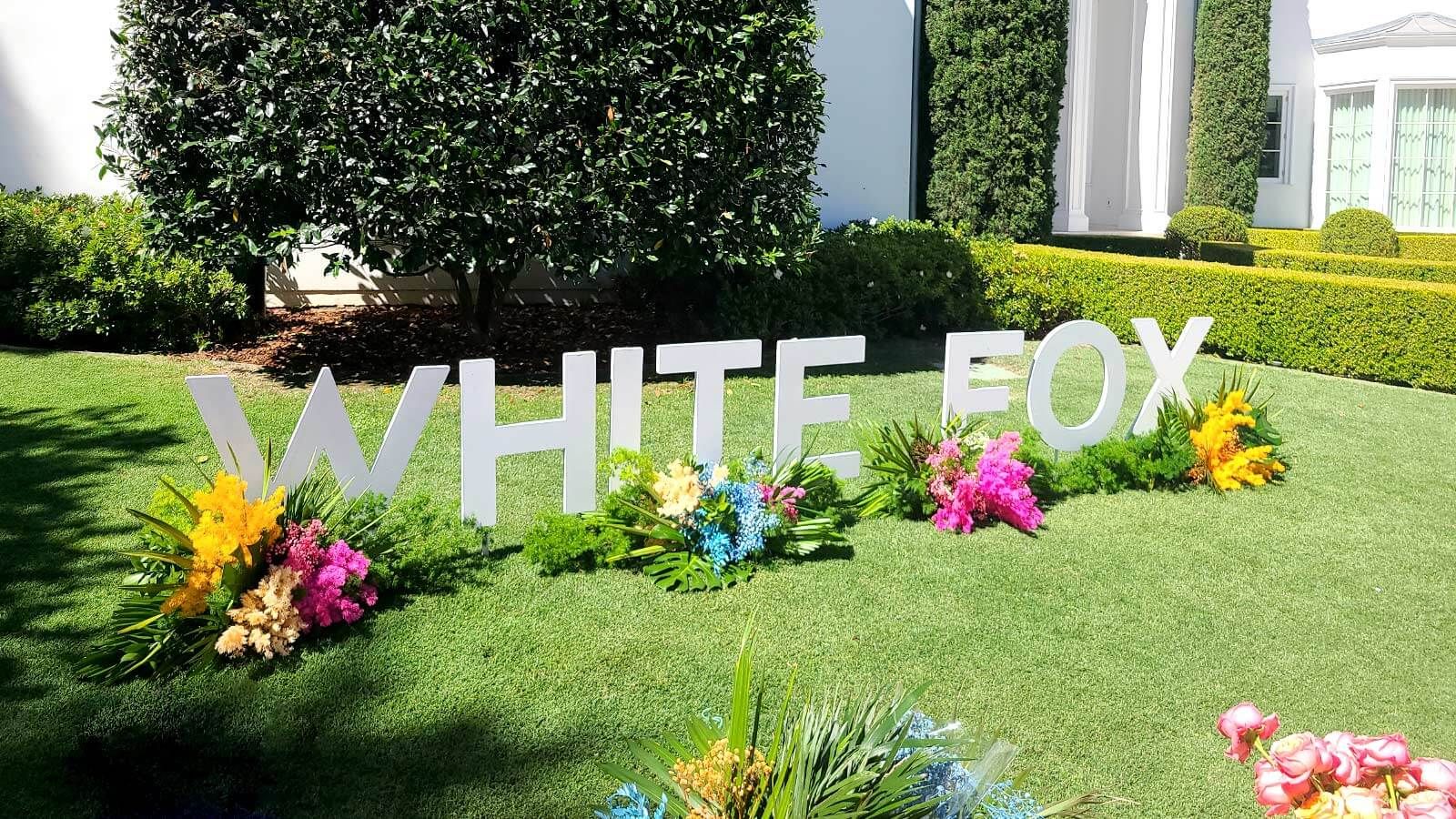 White Fox 3D logo sign placed outdoors