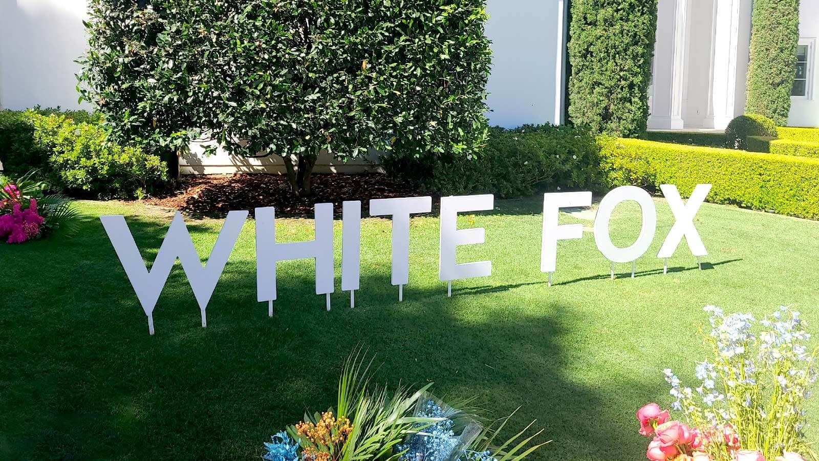 White Fox 3D wooden letters placed on the lawn