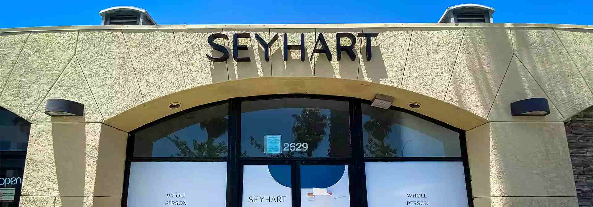 Seyhart exterior store branding solutions in black