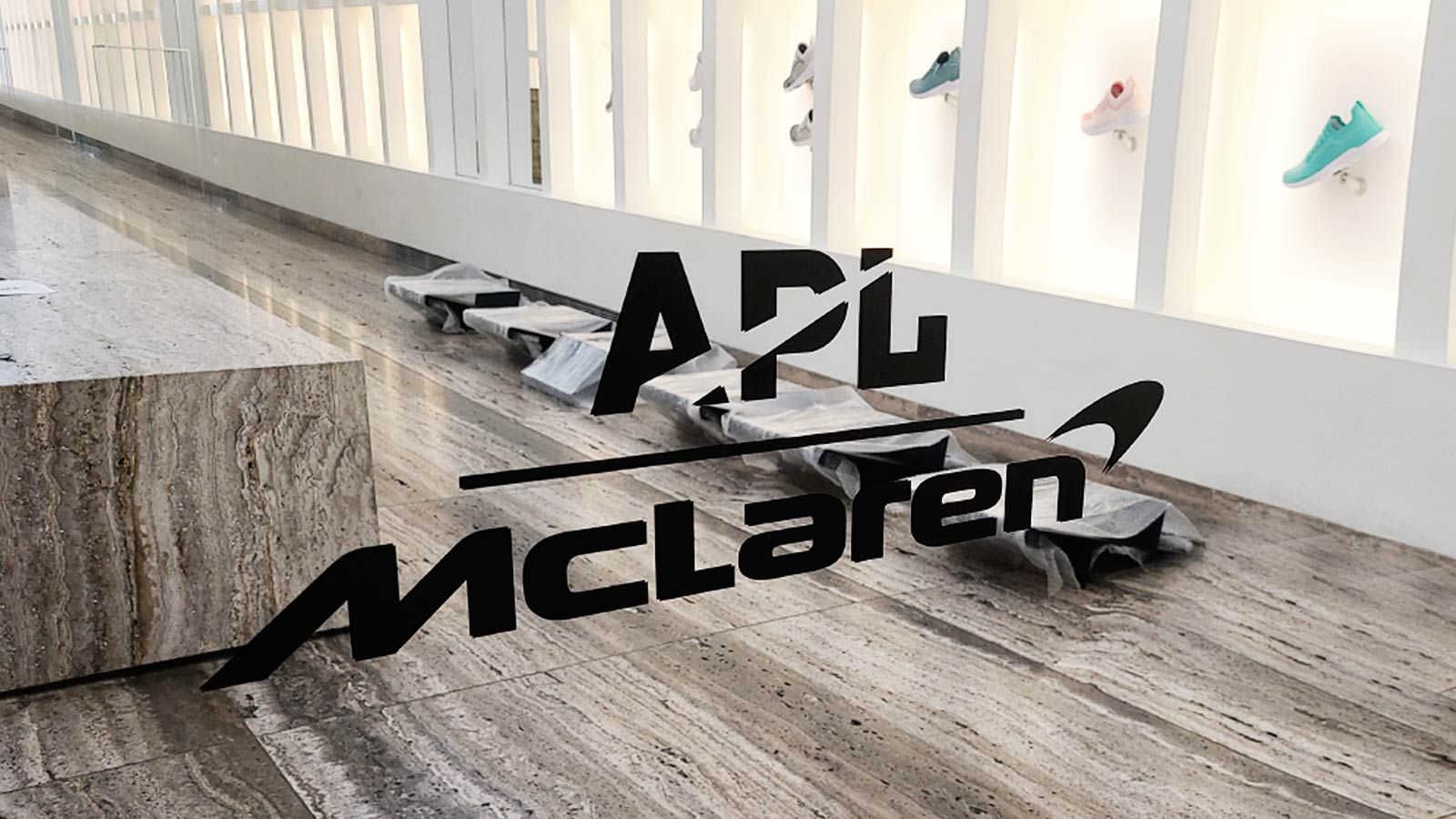 APL Mclaren vinyl lettering attached to the glass