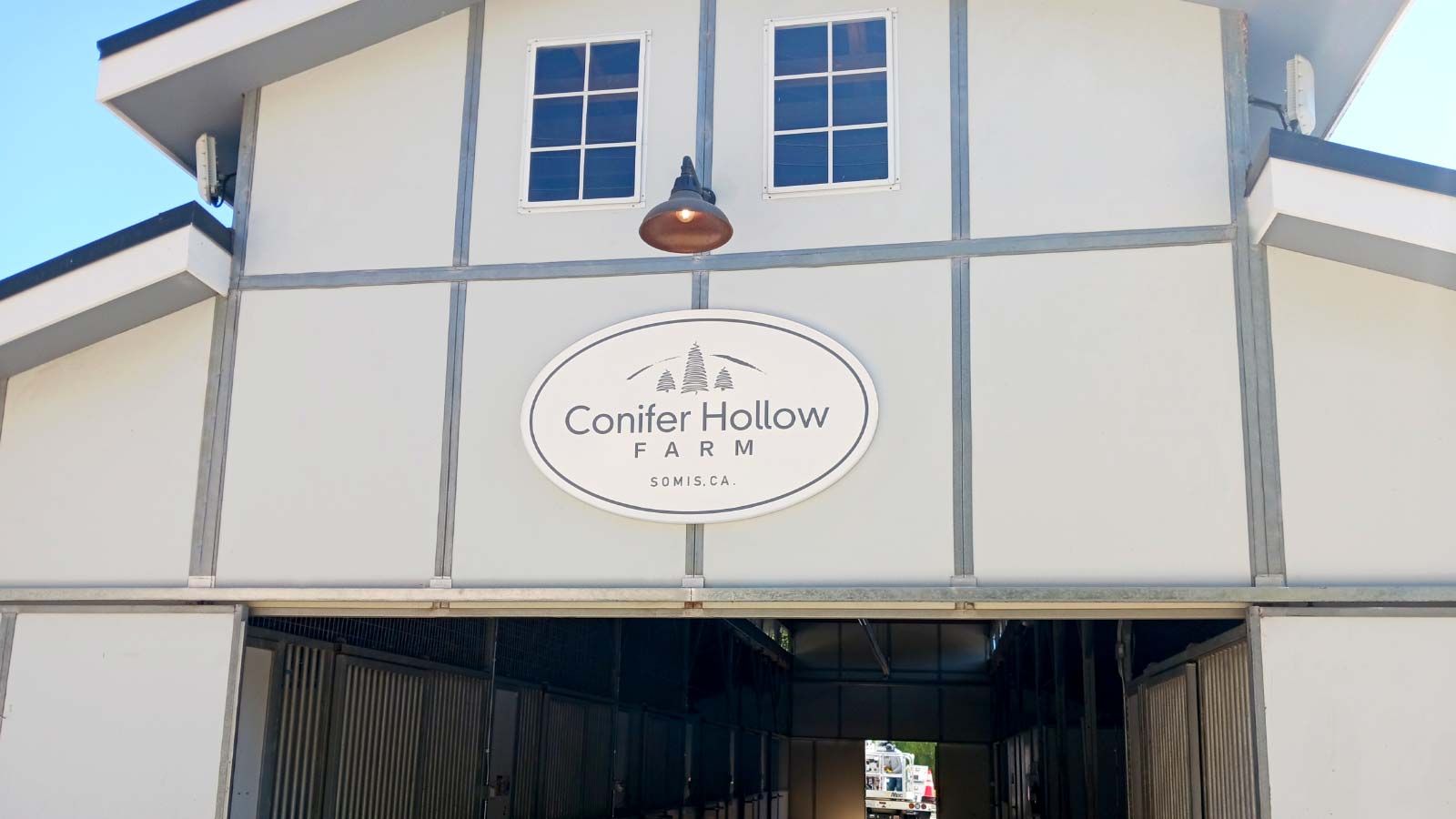Conifer Hollow Farm outdoor sign placed above the entrance