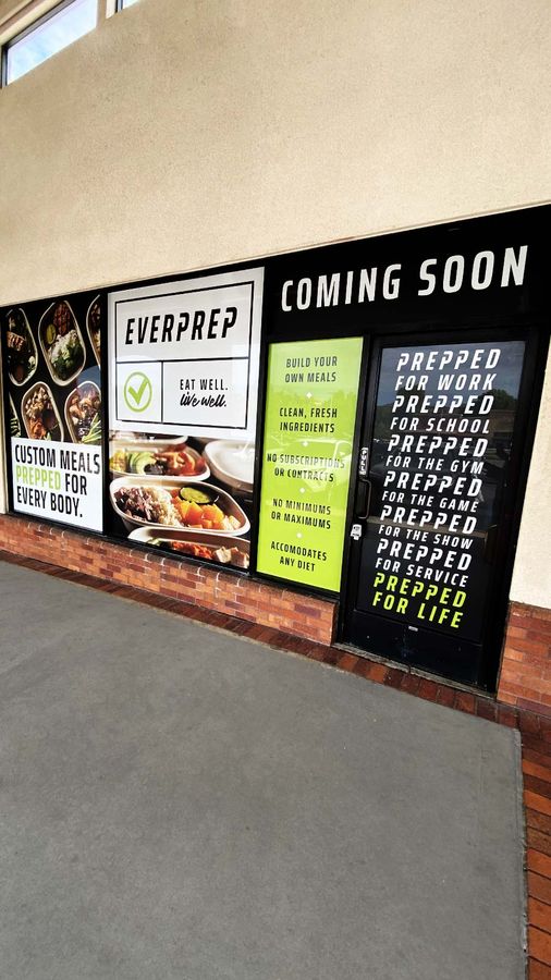 Everprep restaurant signs adhered to the storefront