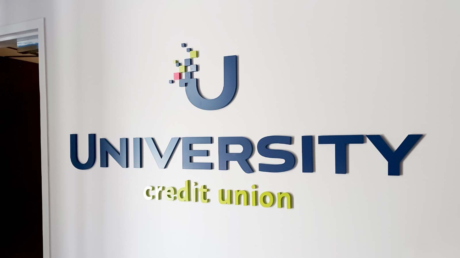 University Credit Union interior sign placed on the wall