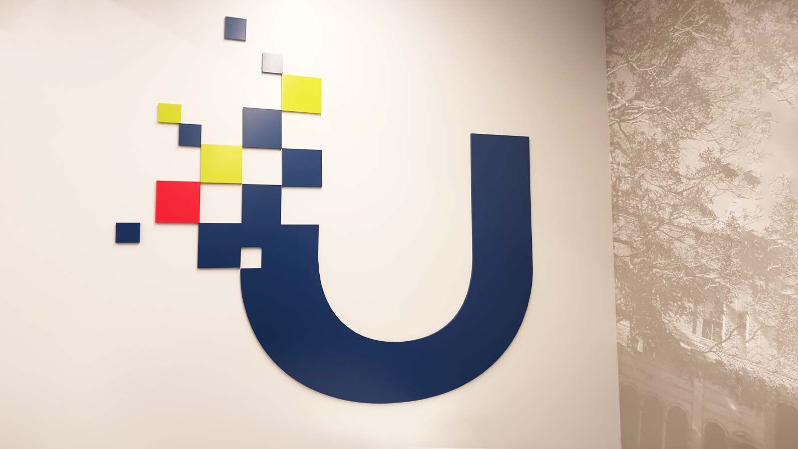 University Credit Union office sign attached to the wall