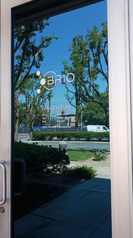 Brio Water Technology vinyl lettering attached to the door