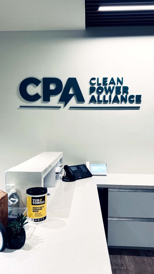 Clean Power Alliance office sign attached to the wall