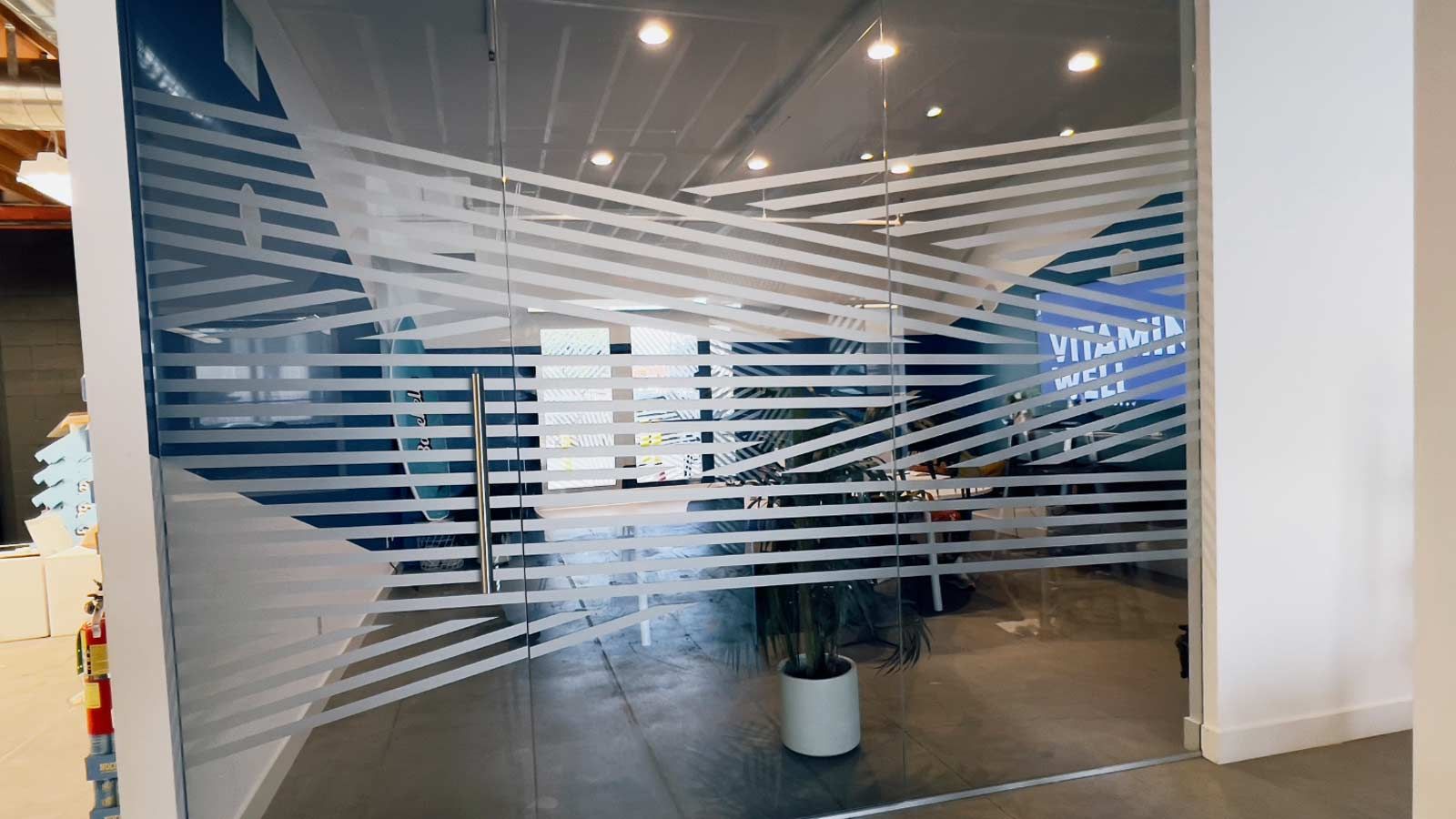 Decorative interior sign applied to the glass