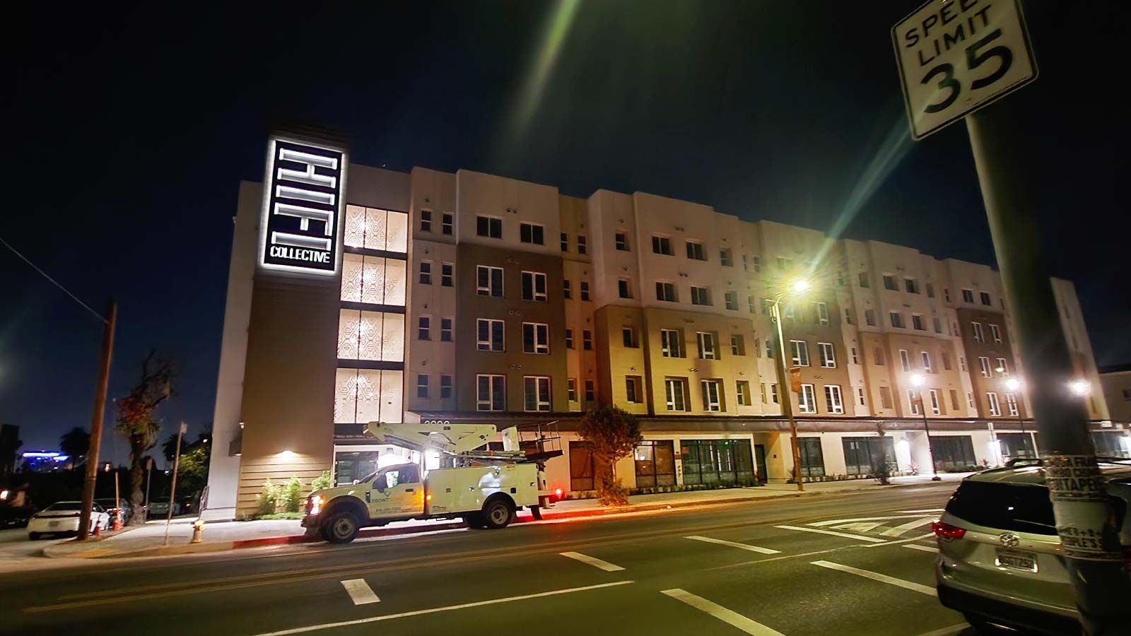 HiFi Collective outdoor sign decorating the building facade