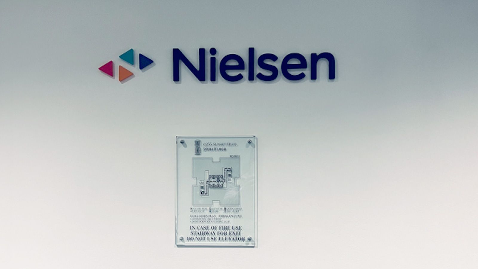 Nielsen 3D sign attached to the wall