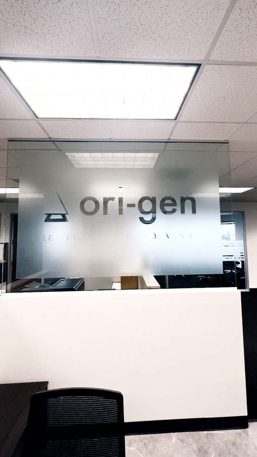Ori-Gen interior sign applied to the glass wall
