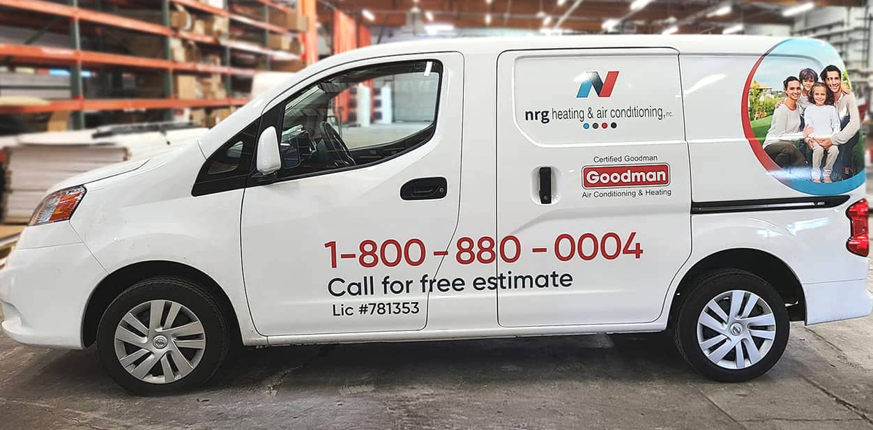 Promotional business vehicle branding solutions displayed on a white van