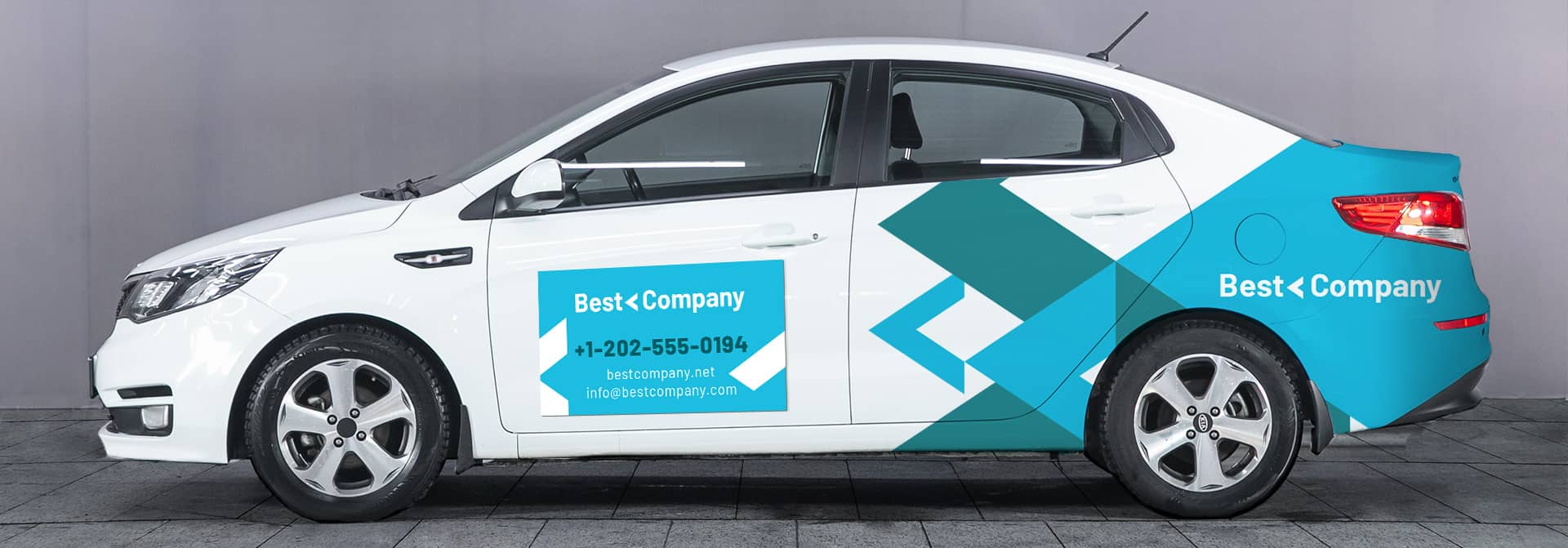 Adhesive and magnetic car branding solutions in blue over a white car