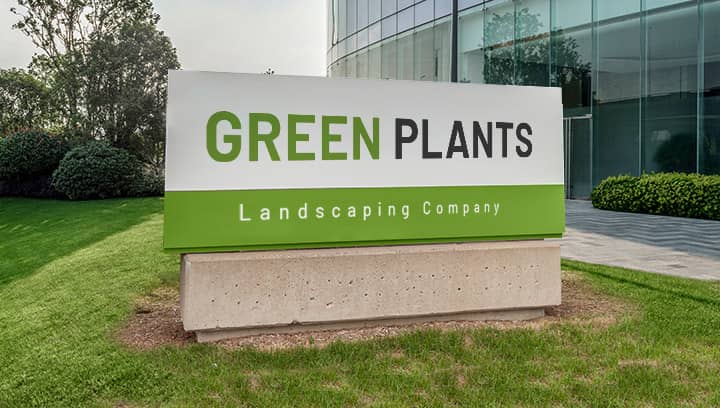 Green Plants business logo sign in a monumental style made of aluminum for outdoor branding