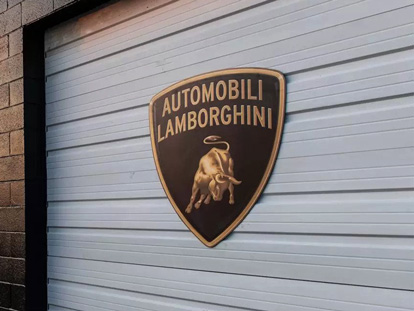 Lamborghini business logo sign in a custom shape made of aluminum for event promotion