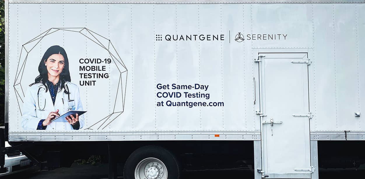 Quantgene vehicle branding solution displaying Covid-19 testing information