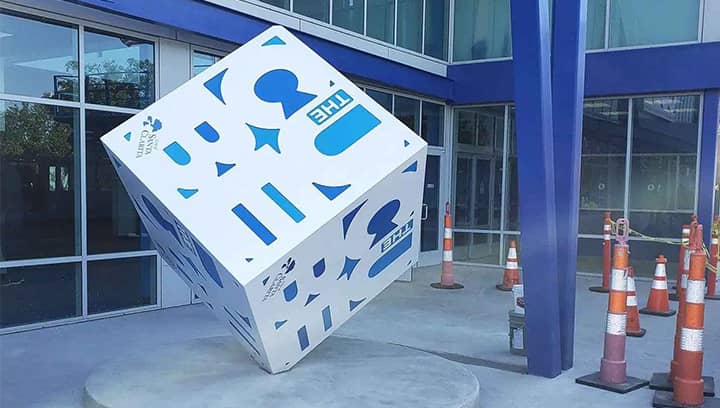 The Cube custom logo sign in a large size made of aluminum for outdoor branding