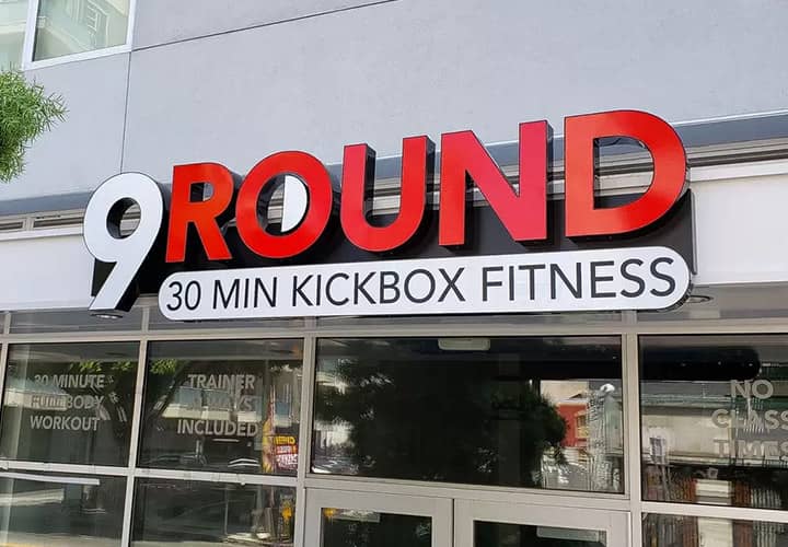 9 Round logo sign with channel style letters made of aluminum and acrylic for gym promotion