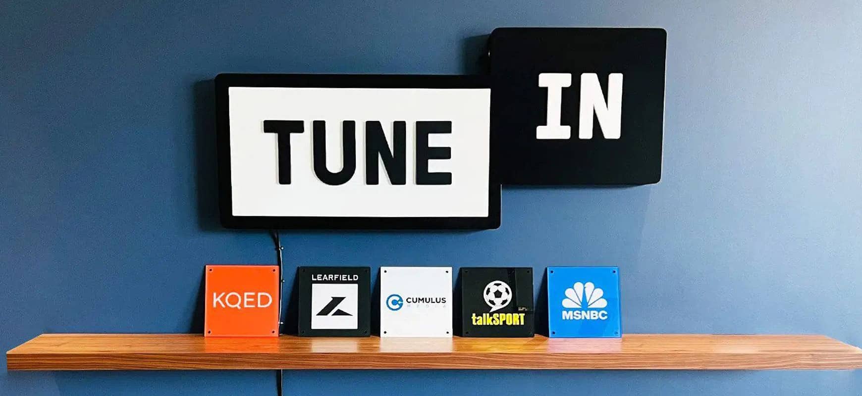 TuneIn logo sign in black and white made of aluminum and acrylic for interior branding