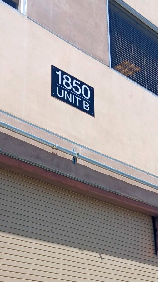 American Garment LLC dibond sign on the building top