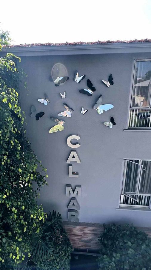 Cal Mar Hotel building signs with butterflies