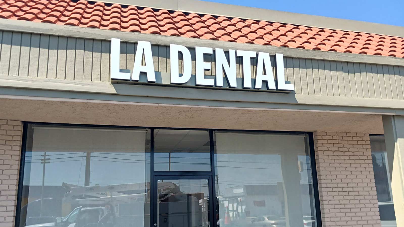 LA Dental channel letters set up outdoors