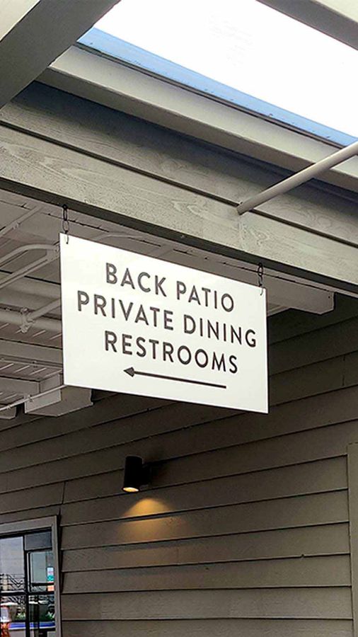 LFNCO restaurant sign hung outdoors