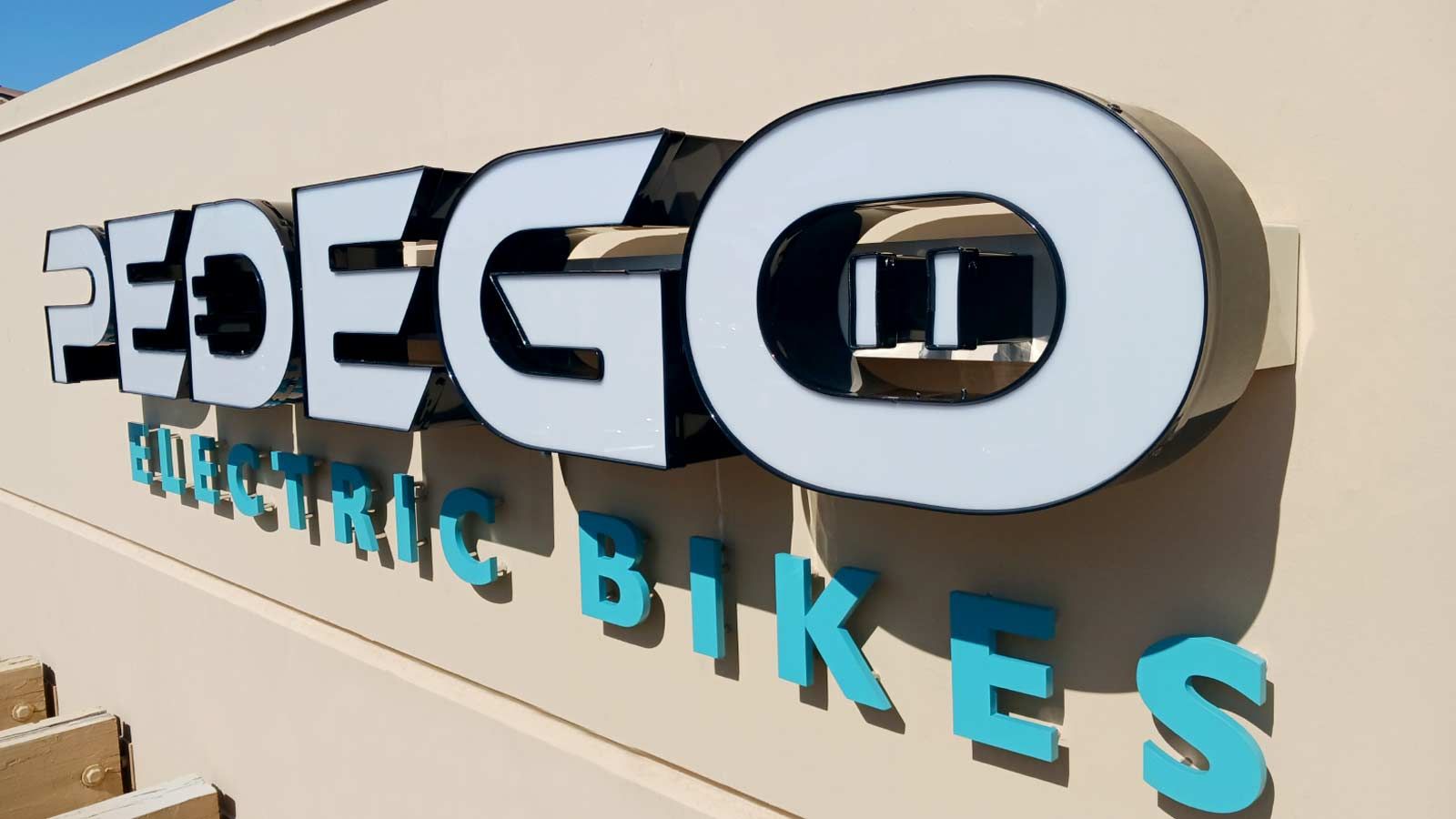 Pedego Electric Bikes 3D signs installed outdoors