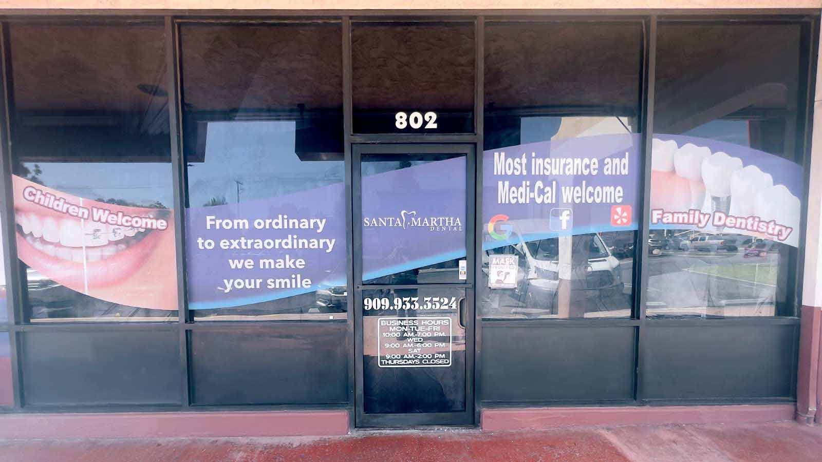 Santa Martha Dental window decals for storefront design