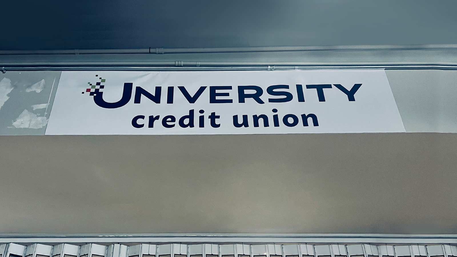 University Credit Union banner set up on the wall