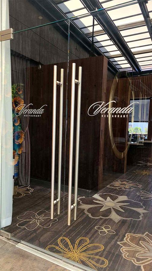 Veranda Restaurant restaurant signs applied to the doors