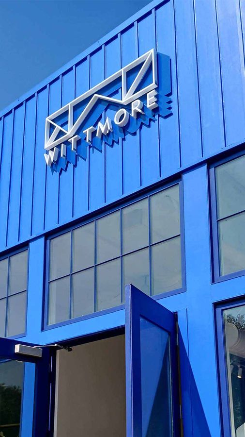 Wittmore outdoor sign attached to the building top