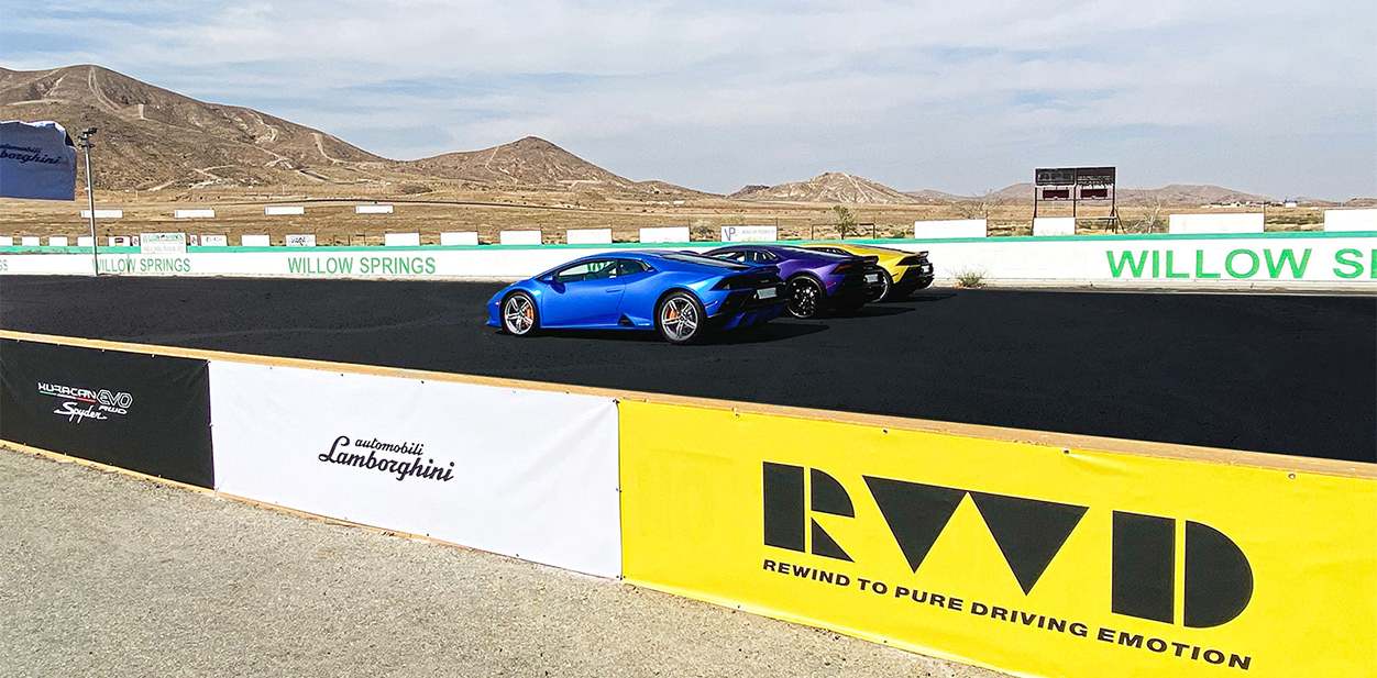 Lamborghini race car event branding with large-scale illustrations