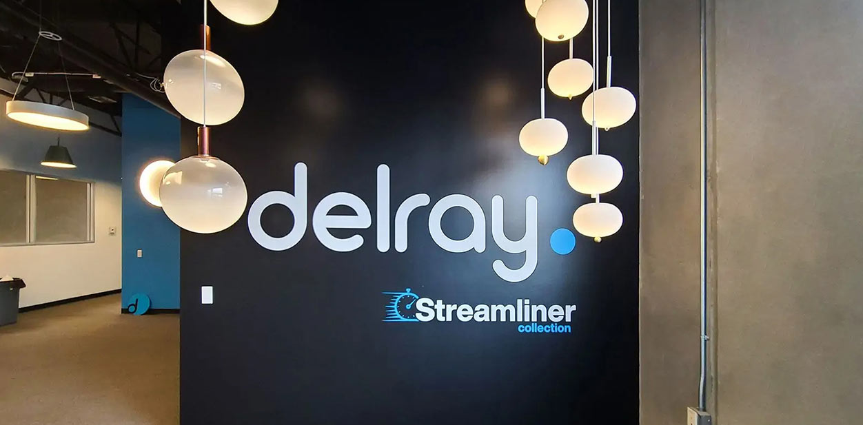 Delray Streamliner feature wall decal displaying the company's logo and name