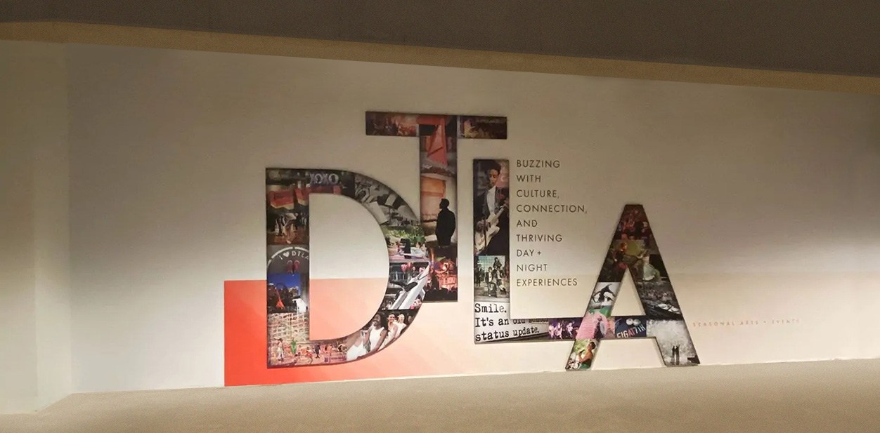 DTLA 3D feature wall with large letters showcasing the company's name and motto